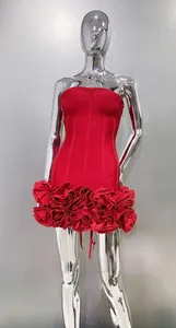 Sexy red strapless mini dress featuring 3D floral hem detail on silver mannequin.
