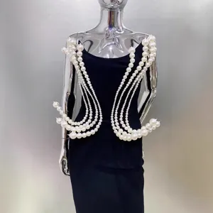 Elegant black strapless bodycon dress with sculptural pearl bead embellishments