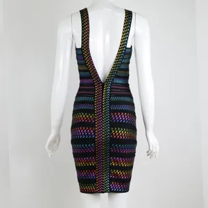 Back view of a colorful rainbow houndstooth bandage dress with deep V back on a mannequin