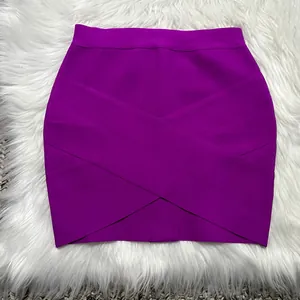 Detailed close-up view of a vibrant purple bandage mini skirt featuring a stylish criss-cross design