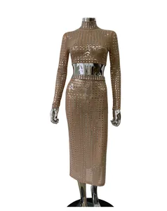 Detailed view of a sheer mesh two-piece set featuring shimmering square silver rhinestones