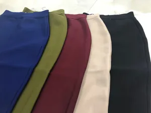 Collection of multi-color high-waisted bandage pencil skirts with ribbed knit texture.