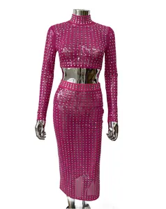 Detail view of the sparkly square rhinestone embellishments on the pink sheer fabric