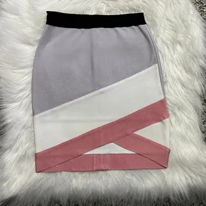Detailed view of a bandage bodycon mini skirt with cross-band and color-block design
