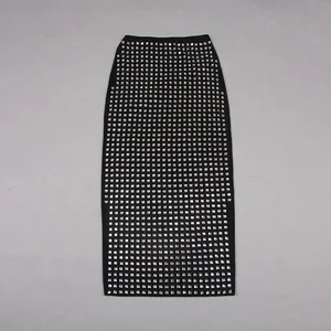 Detail shot of a sexy sheer black bodycon skirt adorned with shimmering square rhinestones.