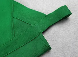 Macro detail showing the high-quality ribbed texture of a green bandage dress strap