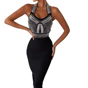 Robe bandage dos nu noire élégante et sexy avec détails de perles blanches complexes