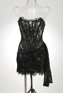 Black lace corset mini dress with fishbone boning and eyelash lace trim details.