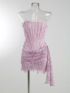 Detailed view of lavender lace corset dress with side streamer and boning