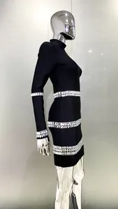 Close-up detail of a black bodycon bandage dress featuring elegant silver rhinestone accents.