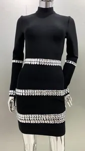 Close-up detail of a elegant black bandage dress with luxury rhinestone embellishments