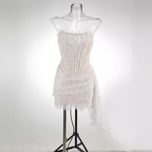 Elegant white lace corset mini dress featuring off-shoulder design and ruched details.
