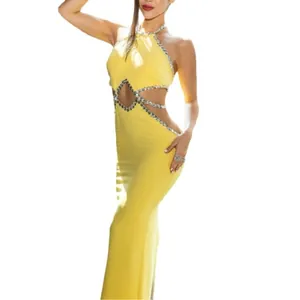 Elegant sexy lemon yellow halter maxi dress with rhinestone trim and waist cut-outs for parties.