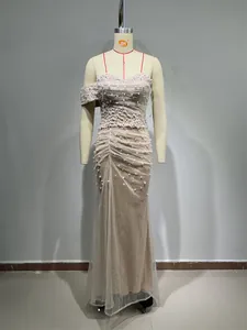 Full view of elegant beaded and sequined evening gown with a unique one-shoulder design.