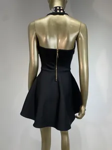 Back view of black halter neck A-line dress with beaded collar and zipper