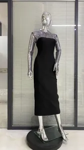Elegantes schwarzes Bandage-Kleid mit glitzernden silbernen Strass-Netzärmeln.