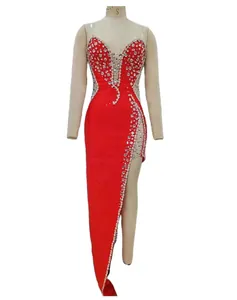 Elegant red rhinestone beaded evening gown with high slit and sheer mesh details