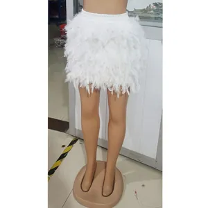 Detailed view of fluffy white turkey feather mini skirt with comfortable elastic waist
