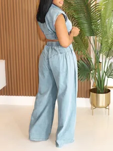 Back view of a trendy blue denim two-piece set with sleeveless top and wide-leg pants