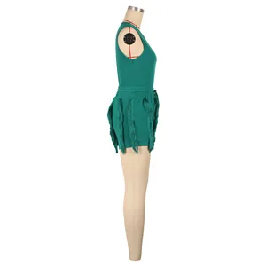 Side view detail of a green sleeveless top and fringe shorts set on a mannequin