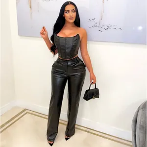Detail of sexy black crocodile pattern PU leather corset and high-waisted pants set