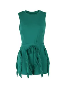 Dark green sleeveless two-piece set with fringe detailing on shorts