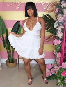 Front view of a sexy sleeveless backless white tiered babydoll mini dress for women