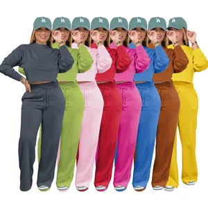 Detailed view of women's two-piece sweatsuit set shown in eight vibrant color options