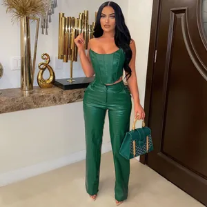 Full body view of green PU leather crocodile pattern strapless corset and pants set