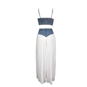 Two-piece fashion set featuring denim cropped camisole and white pleated wide leg trousers