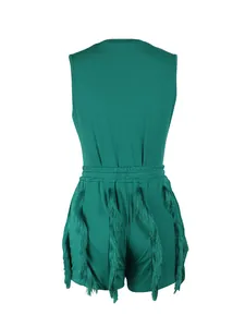 Back view of a dark green sleeveless tassel romper suit with fringe detail and elastic waist