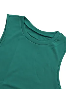 Macro view showing the fine stitching and round neckline of this teal sleeveless romper top