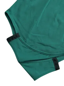 Detail of snap button closure on sleeveless emerald green knit bodysuit for women.
