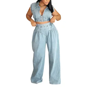 Detailed view of a light blue denim two-piece set with a crop vest and wide-leg pants