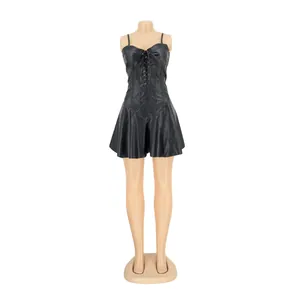 Front view detail of a black PU leather lace-up mini dress displayed on a mannequin.