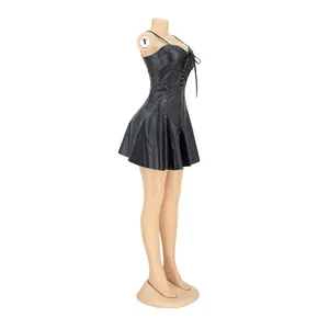 Side view of a sexy black PU leather mini dress on a mannequin for party wear