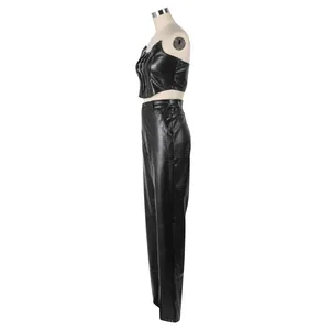 Side view of black PU crocodile pattern two-piece set including bustier top and trousers