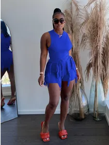 Stylish royal blue summer two-piece outfit featuring a tank top and fringe shorts detail