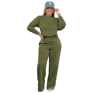Detail view of olive green two-piece women's sweatshirt and sweatpants sports set