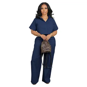 Elegant navy blue linen two-piece set for women featuring short-sleeved shirt and trousers