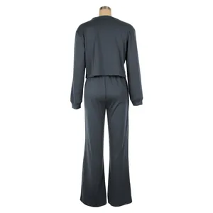 Back view of dark grey two-piece tracksuit set with cropped sweatshirt and pants