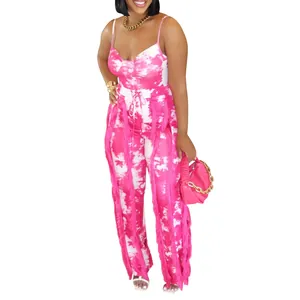 Vibrant pink tie-dye summer set with camisole top and fringe detail wide-leg pants.