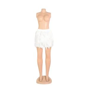 Detailed view of the soft white turkey feather material on a party mini skirt for women