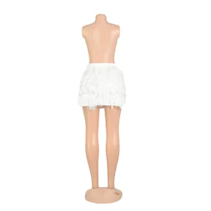 Detailed back view of a white turkey feather mini skirt for party wear on a mannequin