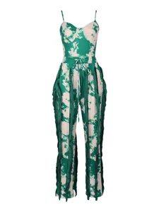 Detailed view of women's tie-dye two-piece set with fringe tassels on pants