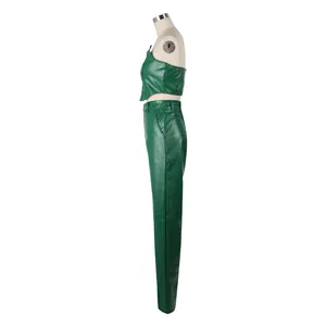 Side view of a green faux leather tube top and pants set featuring crocodile skin texture