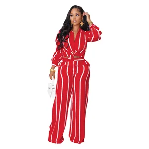 Elegant red and white striped two-piece set featuring tied-waist shirt and wide-leg pants