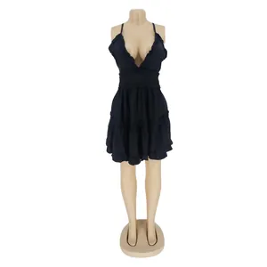 Sexy black sleeveless backless babydoll mini dress with deep V-neck and ruffled tiers.
