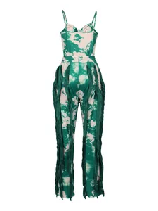 Detailed view of green tie-dye camisole jumpsuit with side fringe accents