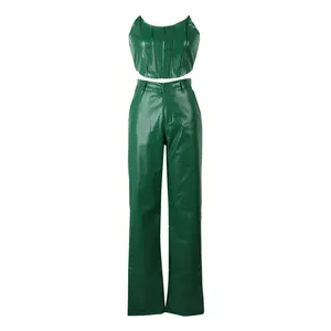 Two-piece green faux leather set with crocodile texture including crop top and pants